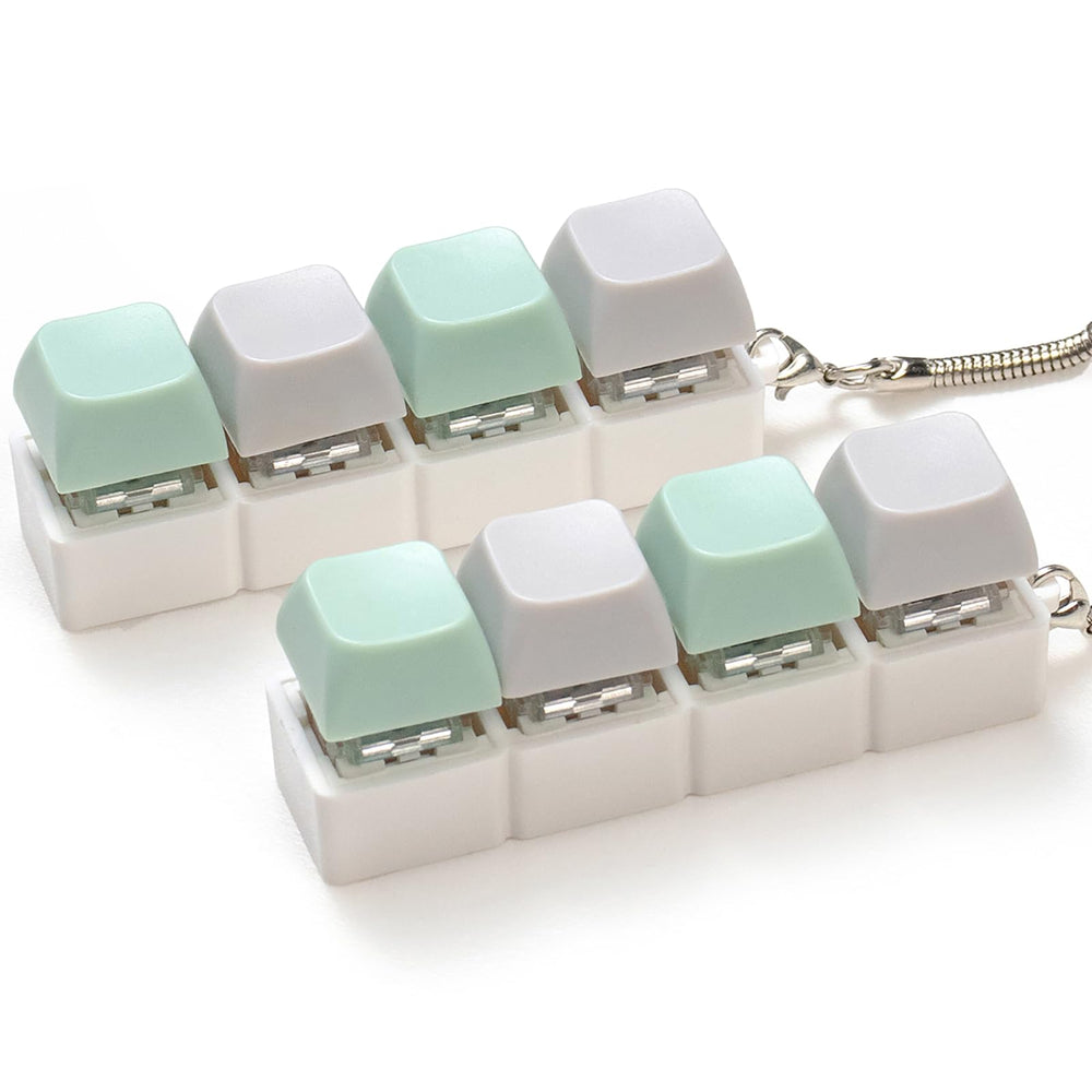Sumgsn green keyboard fidget 2-pcs on desk, soothing tactile clicks for focus.