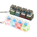 Sumgsn keyboard fidget toy with black light-up cat keycaps for portable focus.