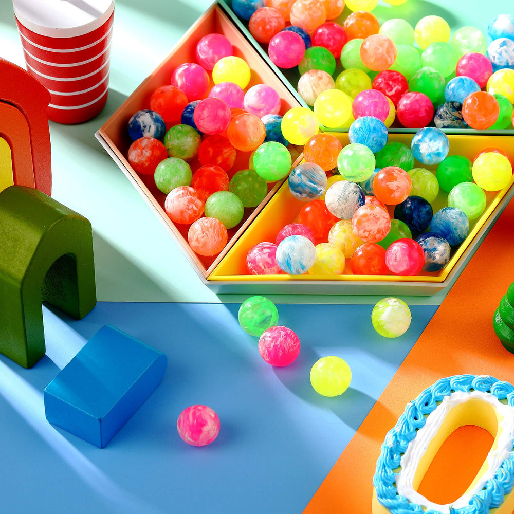 Sumind small rubber ball in neon swirl used as classroom prize.