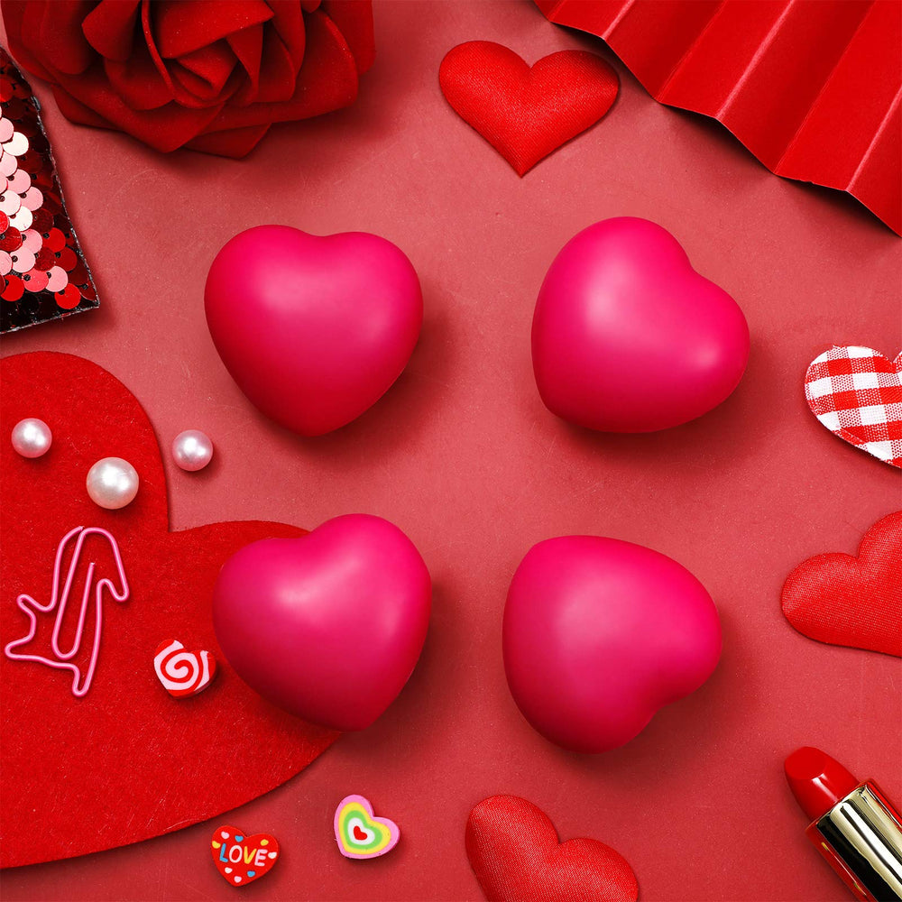 Sumind heart stress ball in hand demonstrates portable size for on-the-go stress relief.