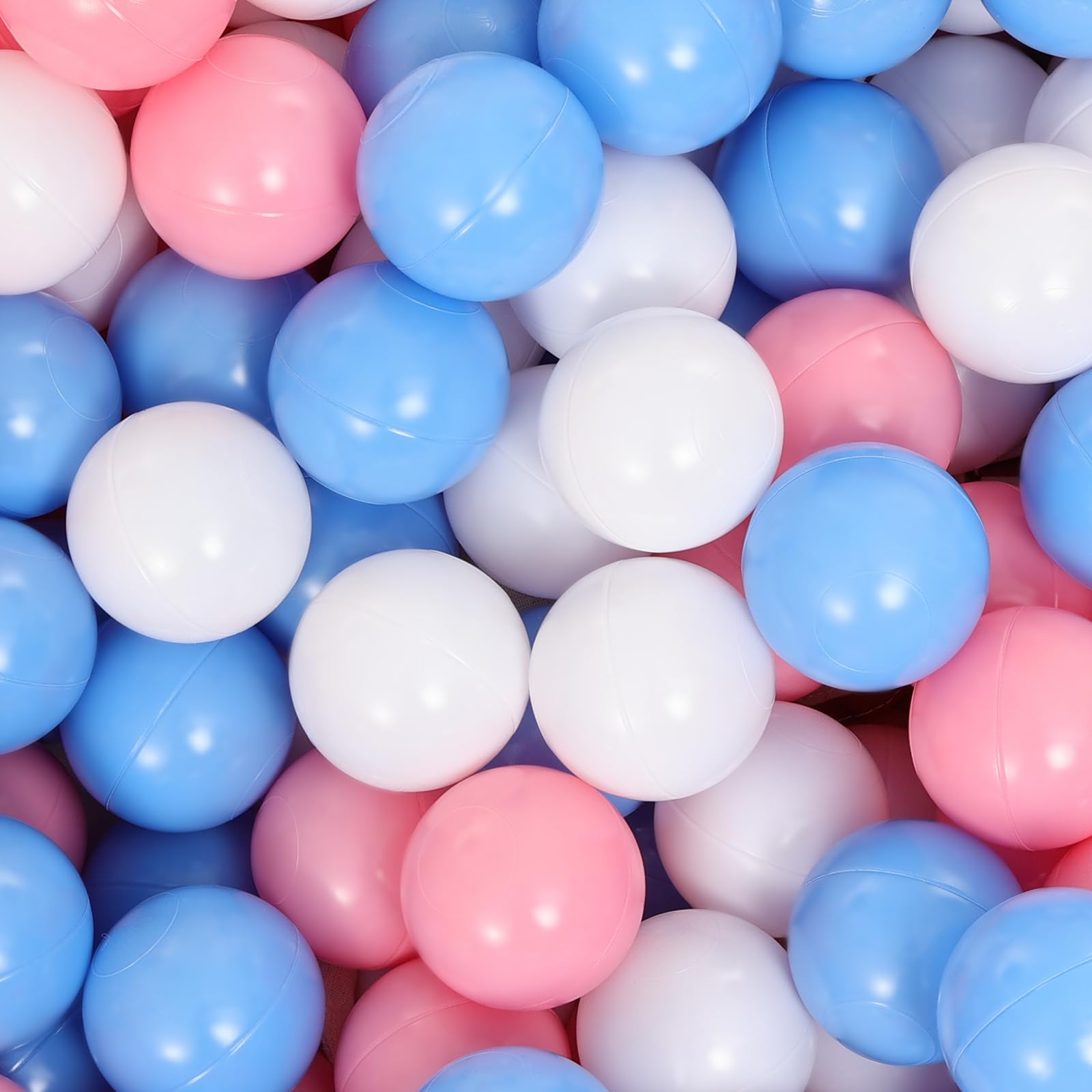Suncuber ball pit with 50 pink, white, and blue balls for safe, engaging play.