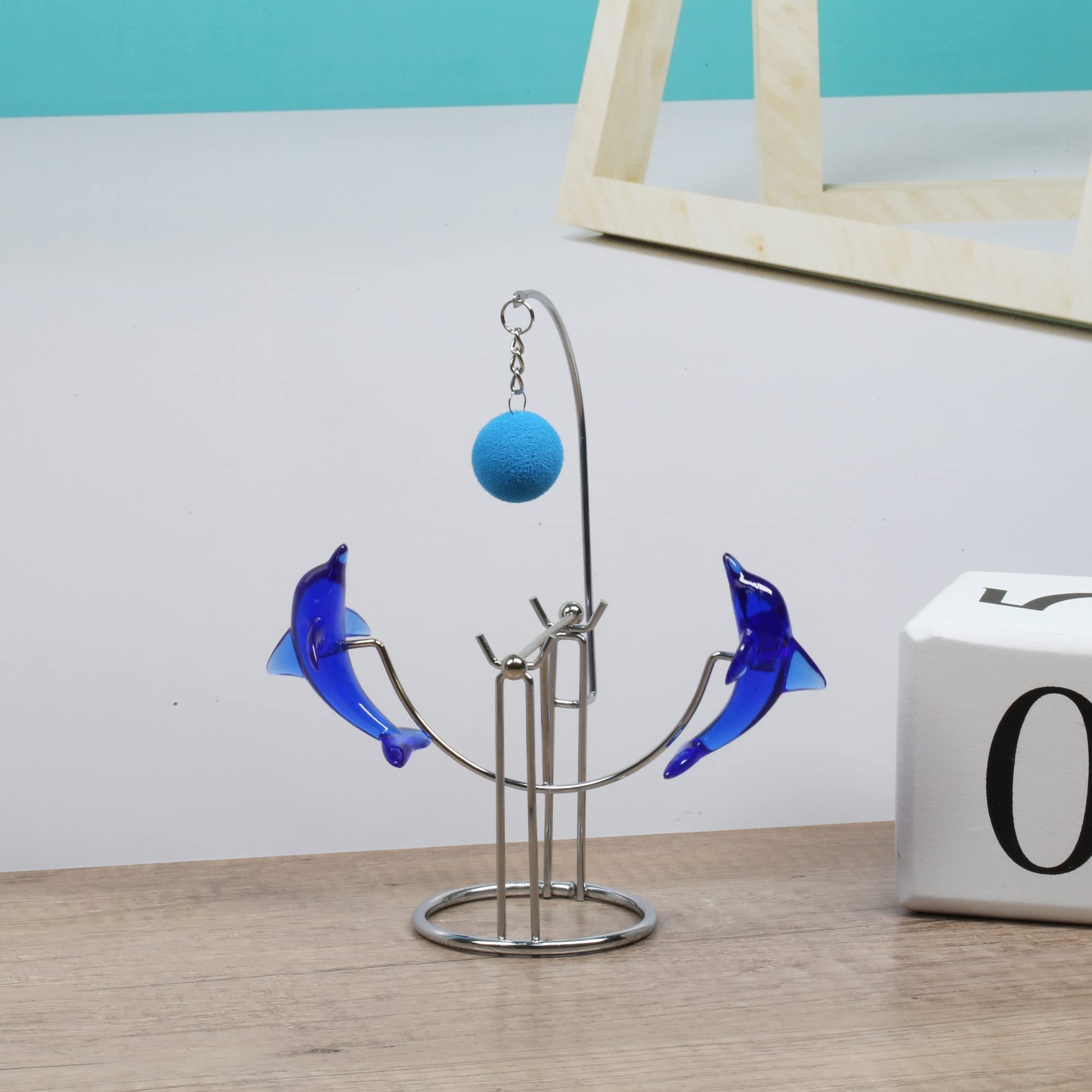 Sunnytech Dolphins metal desk toy doubles as modern decor