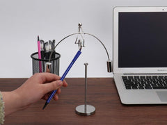 Sunnytech Educational pendulum motion illustrates momentum and energy concepts on your desk.