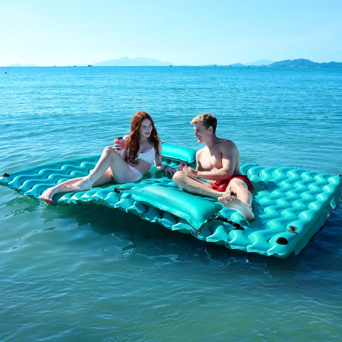 Sunrio giant floating mat on water provides spacious lounging for sun-soaked days.