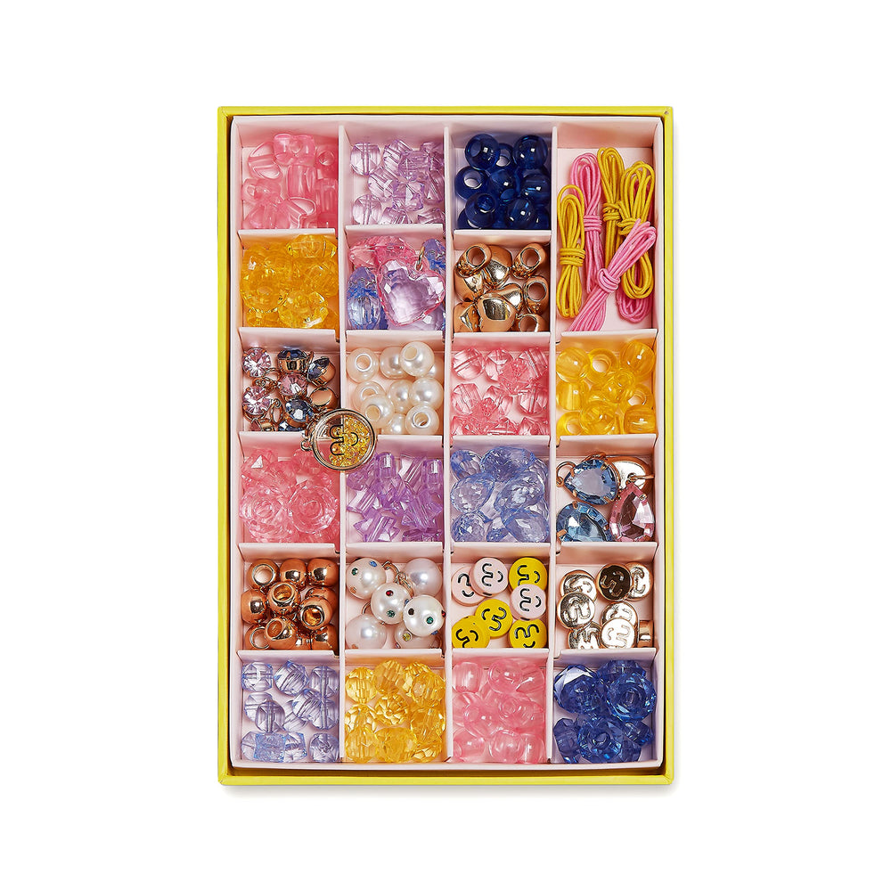 Super Smalls Make It Super DIY bead kit with smiley-face beads for playful designs.