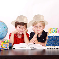 Super Z Outlet kids wearing safari hats illustrate imaginative play and costume readiness.