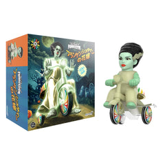 Super7 Bride of Frankenstein wind-up trike glow for display and play.