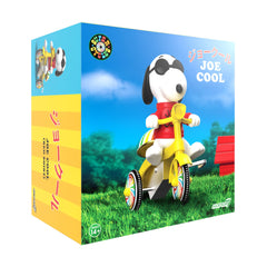 Snoopy Joe Cool red trike side view showing the wind-up mechanism