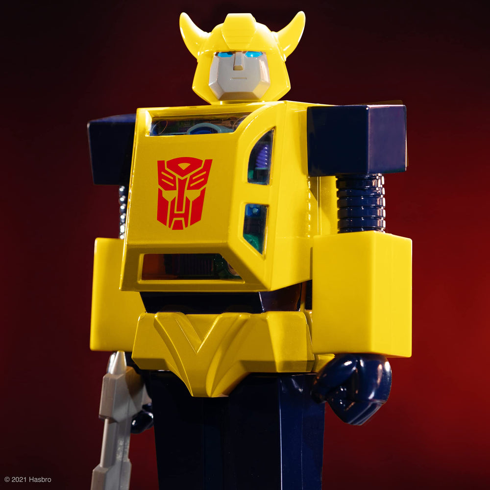 Super7 Bumblebee torso-panel reveal shows inner mechanics for immersive display.