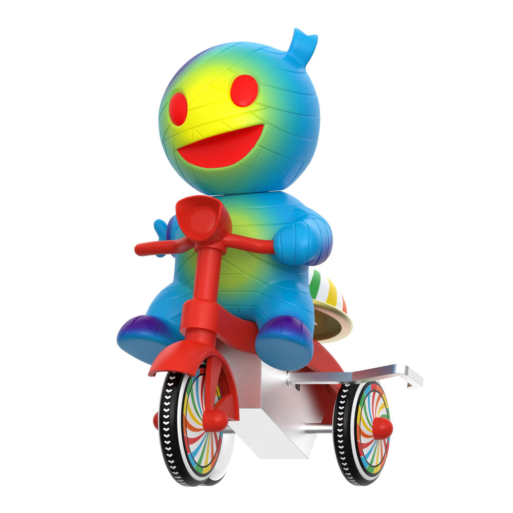 5-inch scale Mummy Boy on wind-up trike with bell above the back tire.