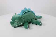 Texture close-up on Surreal Entertainment Godzilla plush surface for tactile appeal.