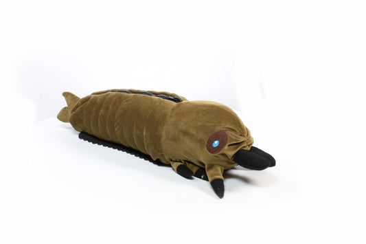 Surreal Entertainment Mothra larva plush close-up shows soft textures.