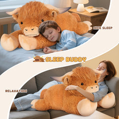 SuzziPals giant Highland cow plush on bed, ideal cuddle companion for relaxation
