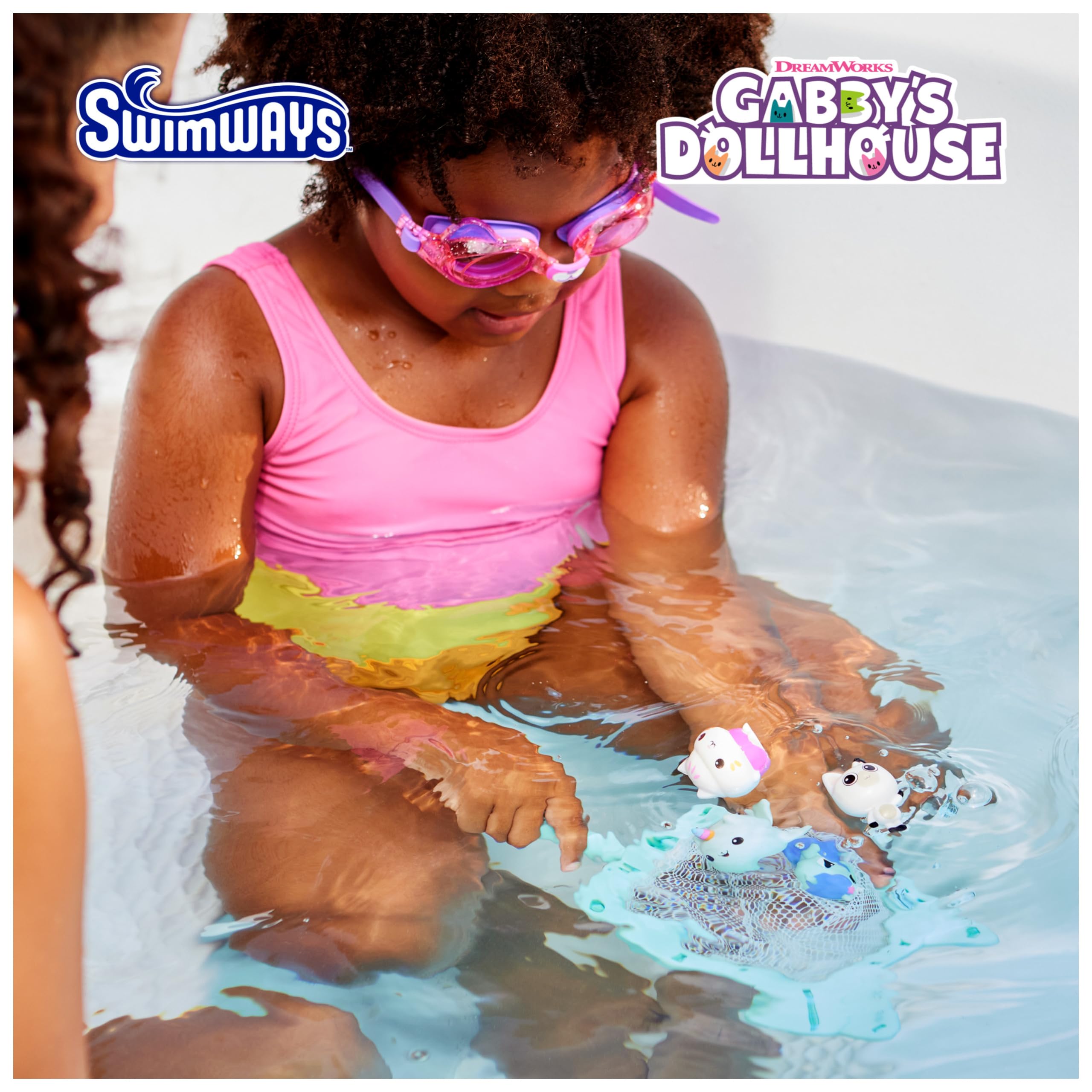 SwimWays Gabby’s Dollhouse Dive n Catch Mercat character diving in the pool.