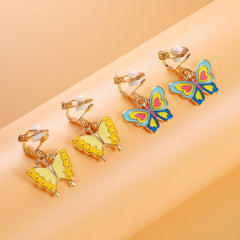 SYNLIN butterflies clip-on earrings for light, playful outfits.