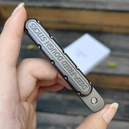 T-Conceal EDC Fidget Slider front view showing compact metal design for everyday carry