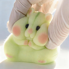 Taba squishy hamster toy compact size fits palm for on-the-go fidgeting.