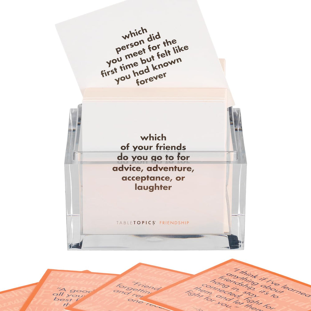 TableTopics girls night setup with colorful cards for fun, inclusive discussions.