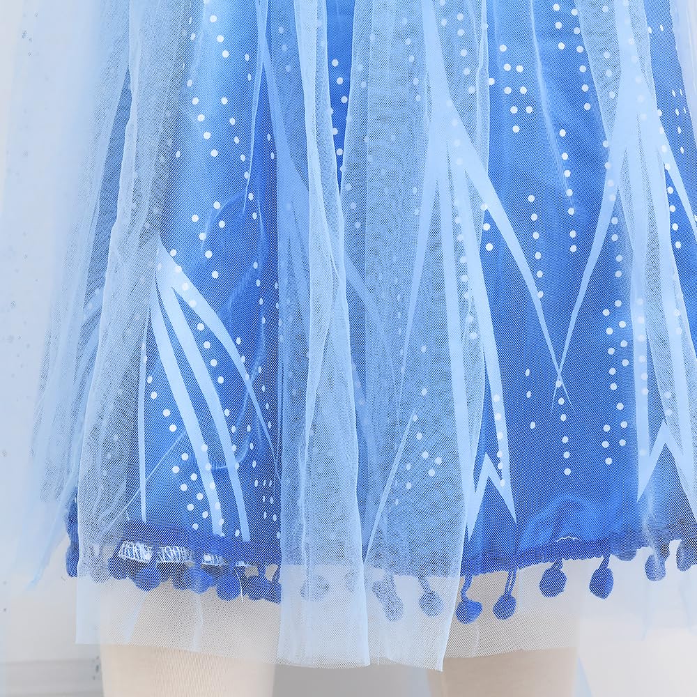 Tacobear dress hem pom-poms create playful movement during dances.