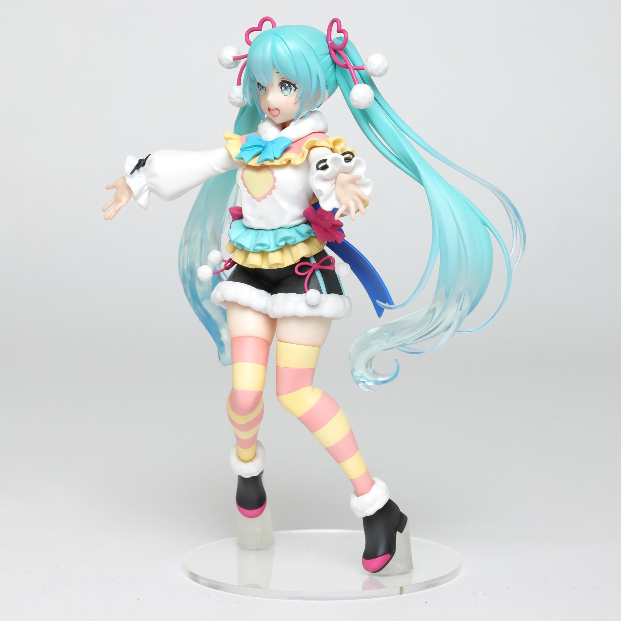 Taito Hatsune Miku Winter Version figure on desk display for fans.