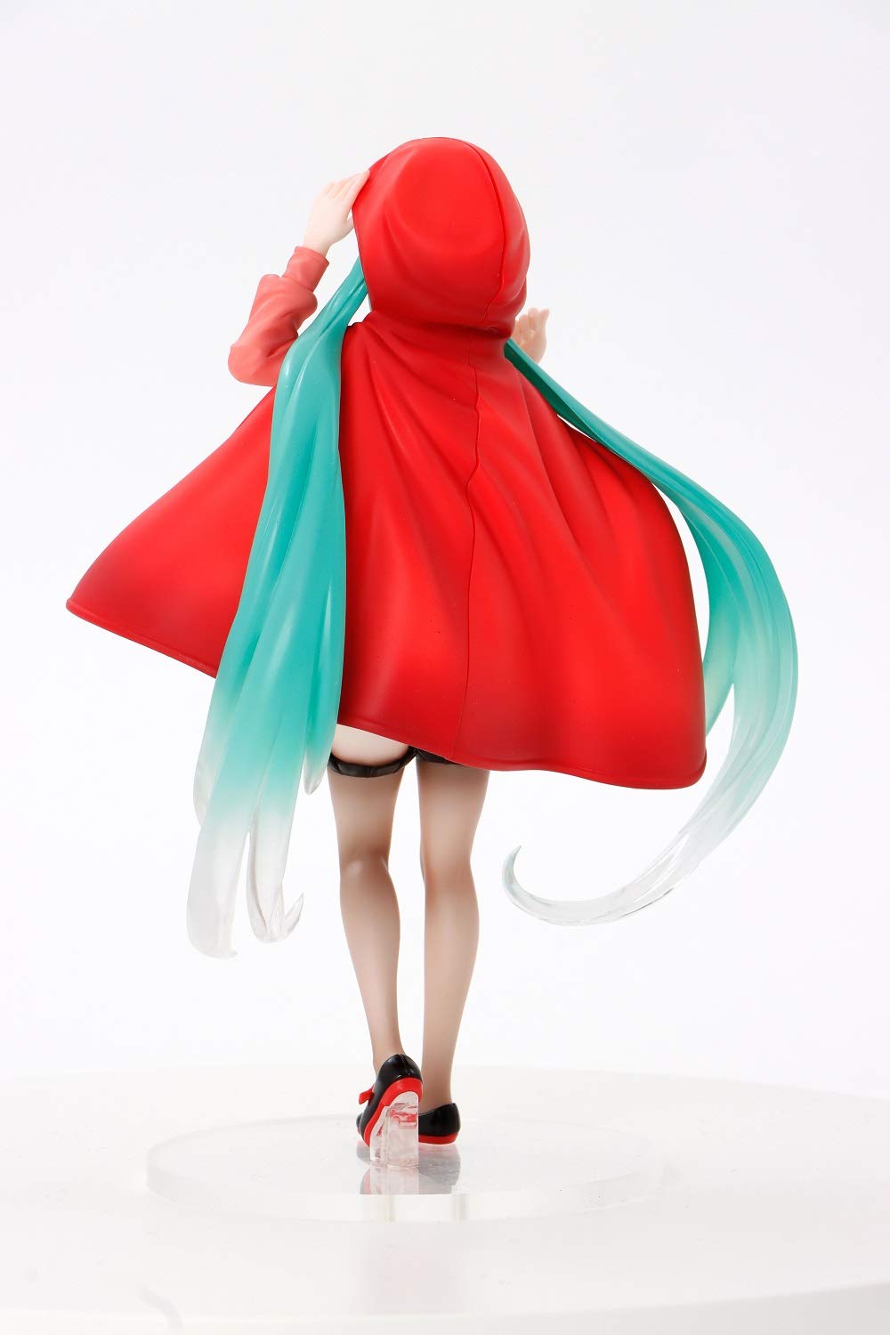 Side view highlights pose and outfit of Hatsune Miku Wonderland Figure