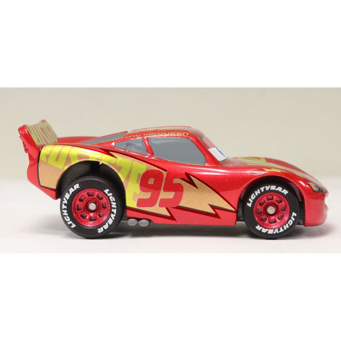 Takara Tomy Lightning McQueen RRC Type open-window chassis for easy setup and tactile interaction.