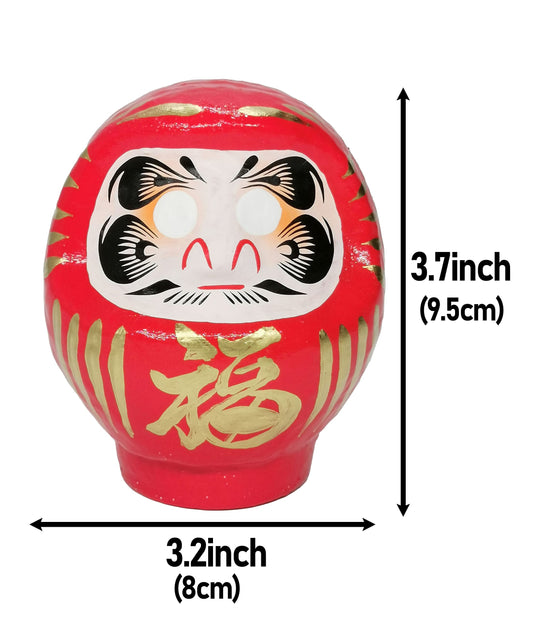 Takasaki Daruma red face close-up showcases hand-painted features and traditional craftsmanship