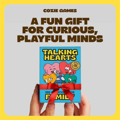 Hands holding Talking Hearts cards ready for a cozy chat.
