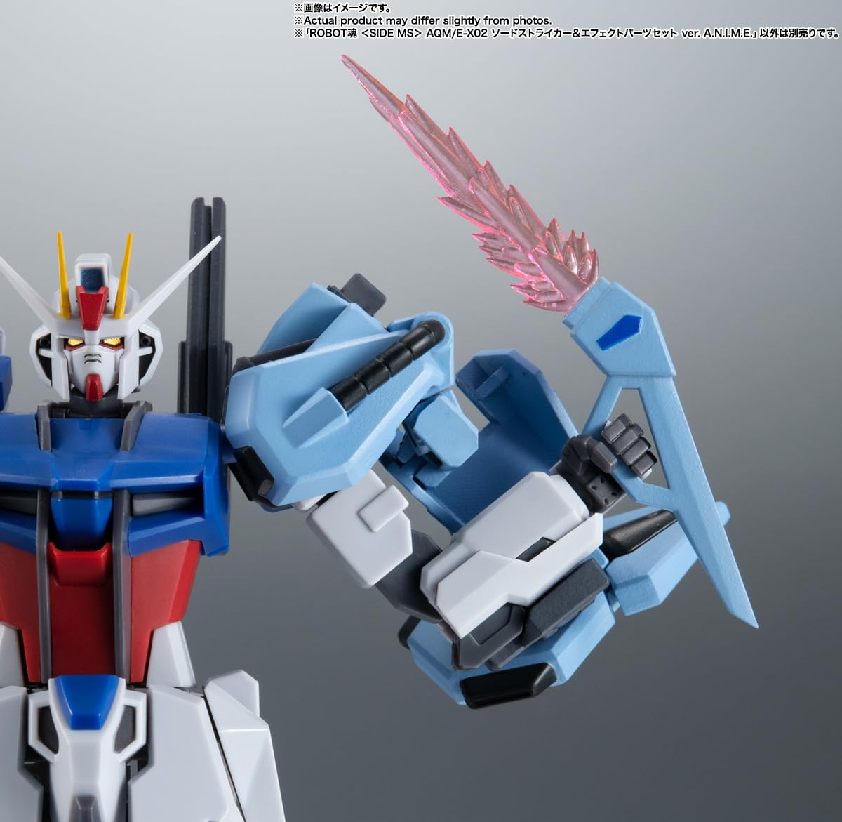 TAMASHII NATIONS Gundam Seed figure posed with Striker for dynamic scenes.