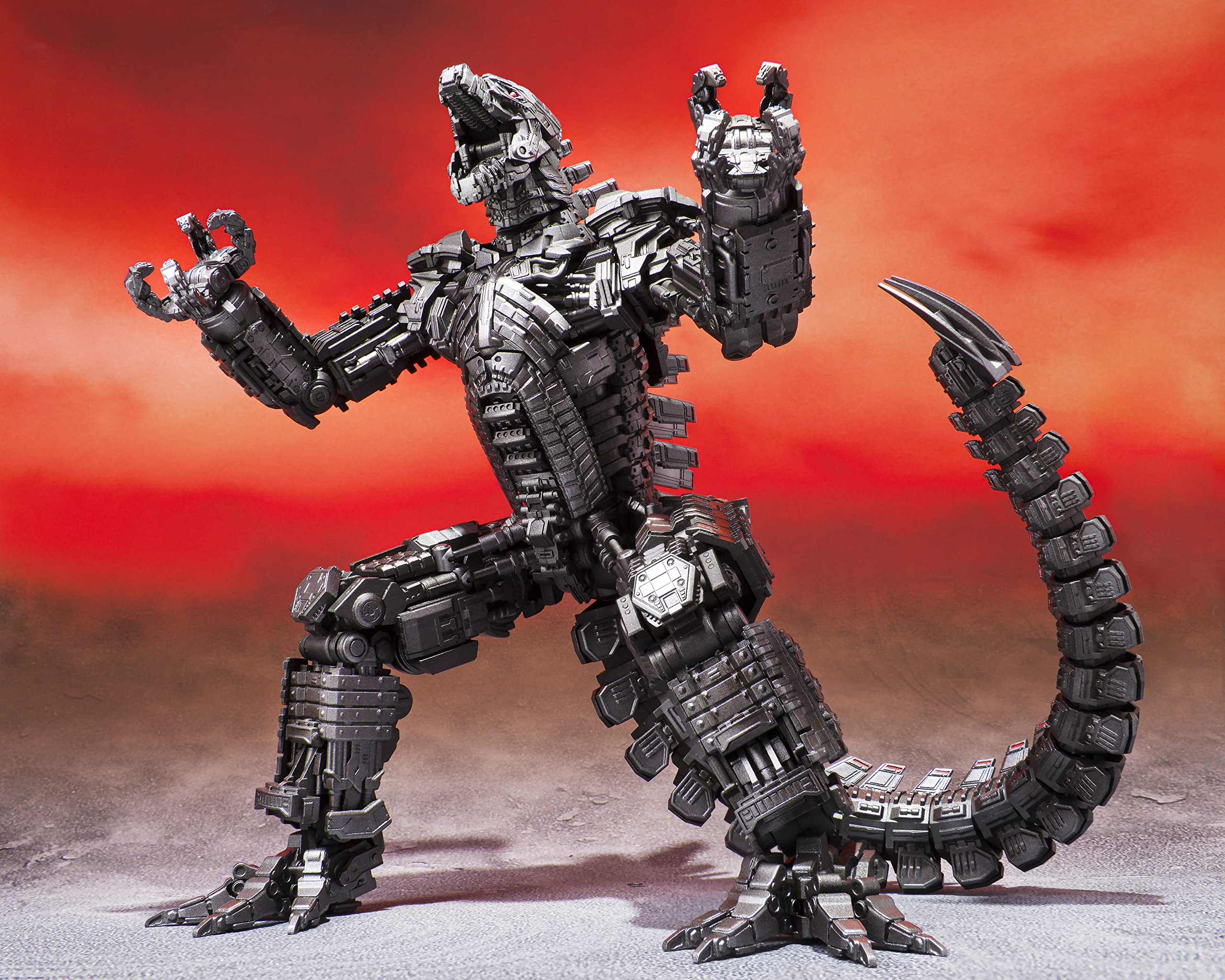 TAMASHII NATIONS Mechagodzilla chest cannons with detailed texture for display.