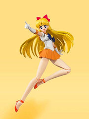Glasses-hand accessory for a scholarly Sailor Venus look.