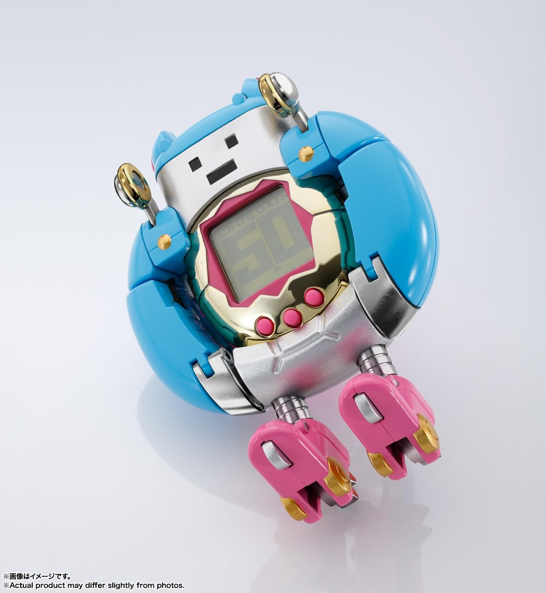 TAMASHII NATIONS Tamagotchi UFO-to-robot transformation in progress