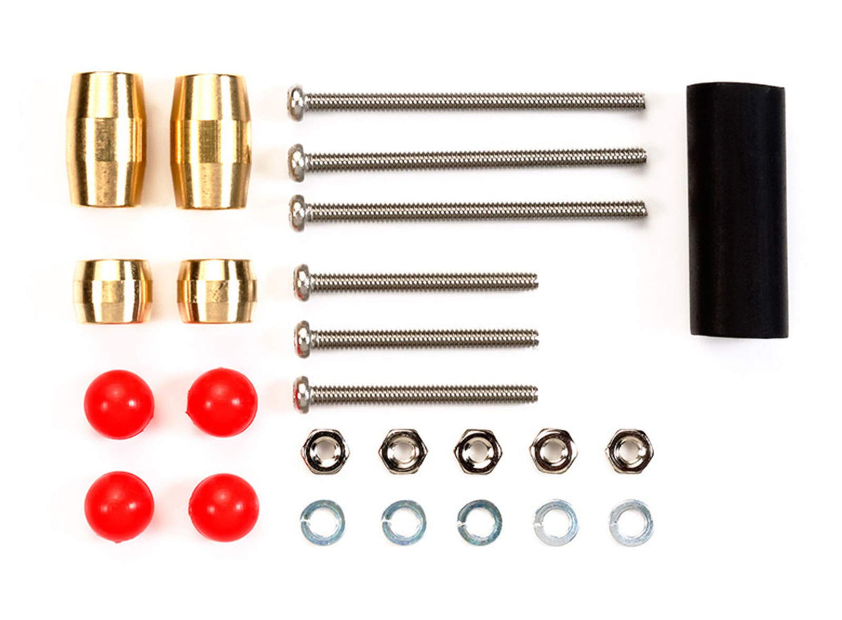 Tamiya 15501 GP.501 slimline mass damper installed on RC chassis for improved stability