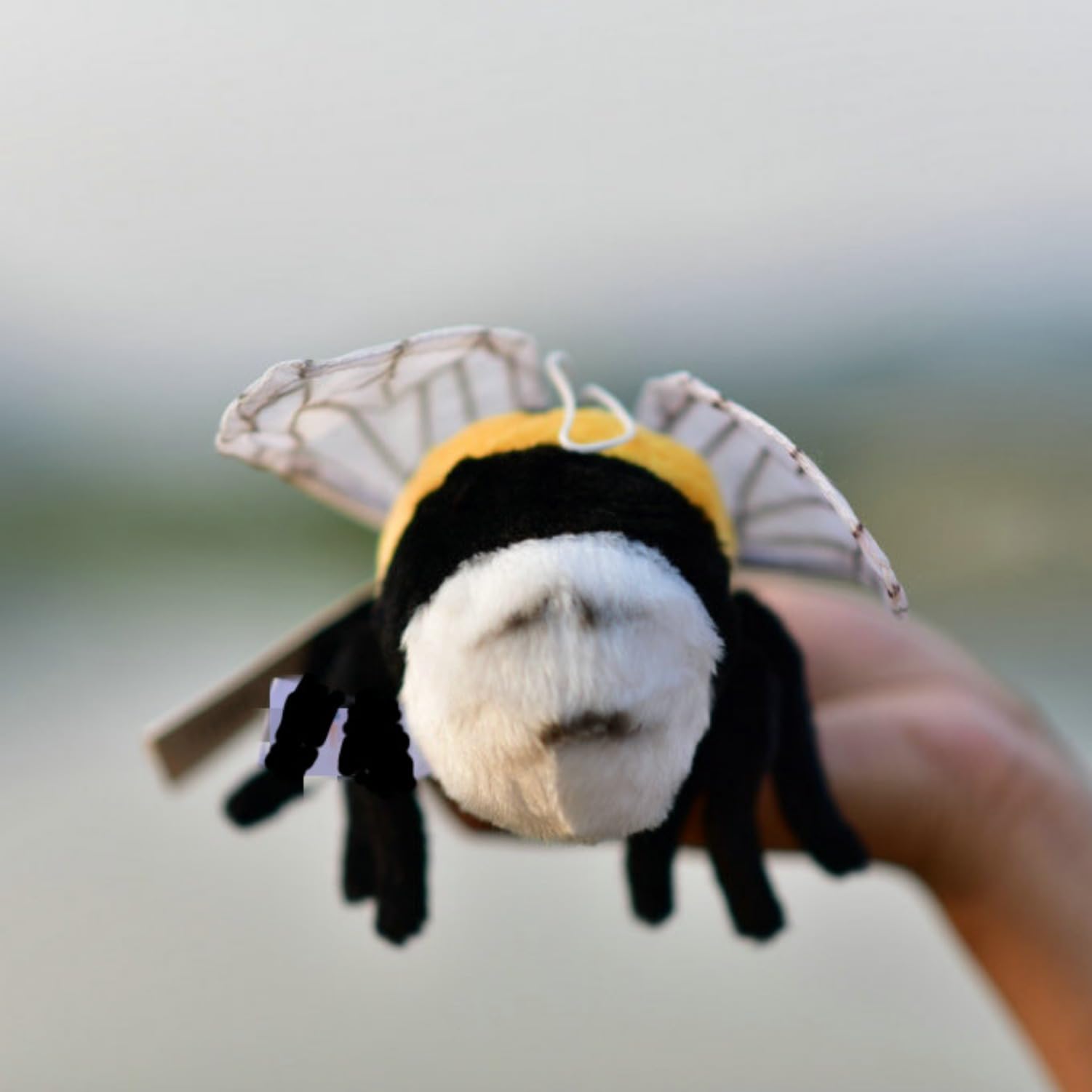 TammyFlyFly bee plush in-hand size suitable for little hands and travel.