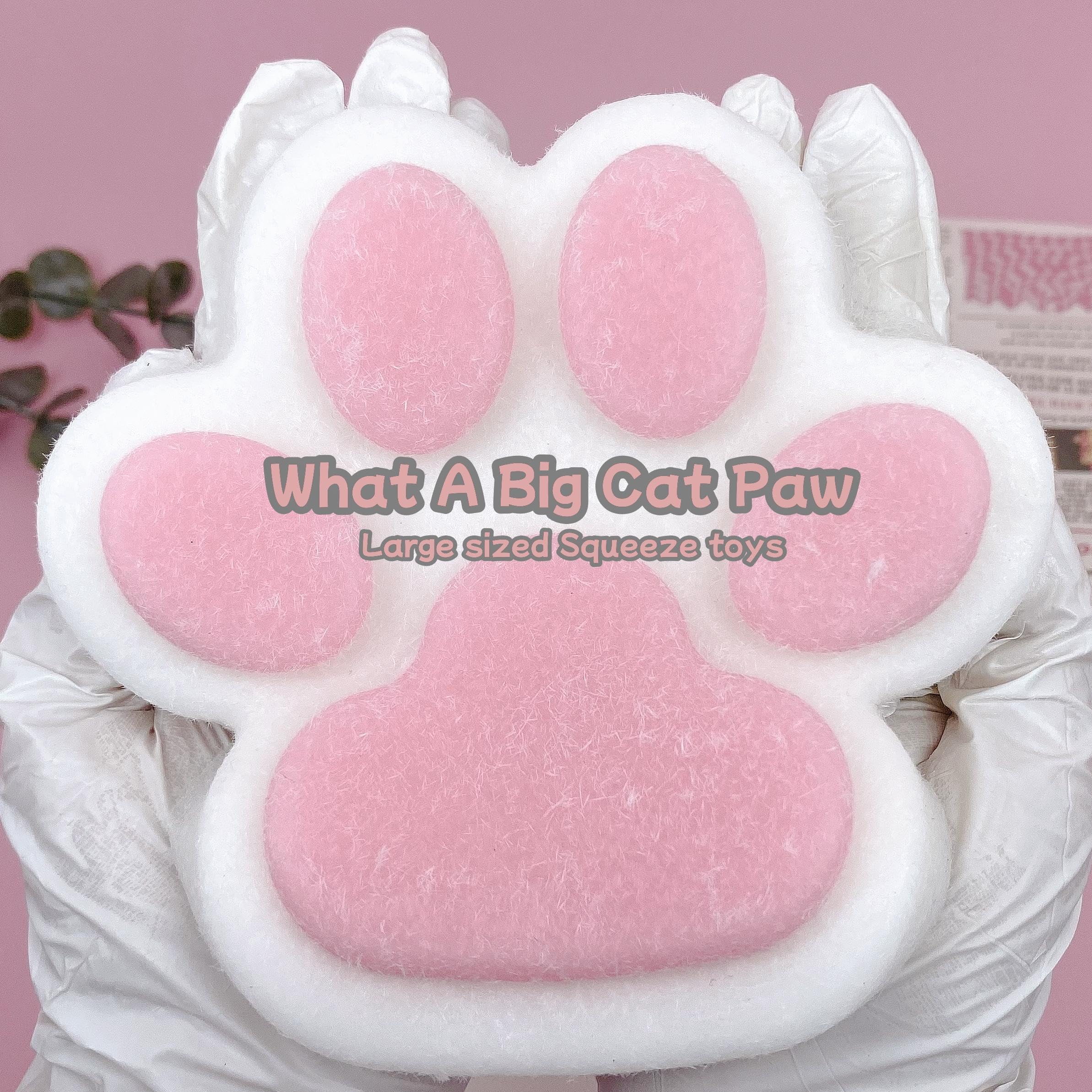 Tangcii Big Cat Paw Squishy in hand demonstrates large 5.5 inch grip