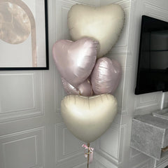 TAOYE cream heart balloons for elegant wedding decor.