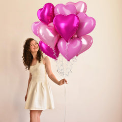 TAOYE hot pink heart balloons add bold focal points to events.