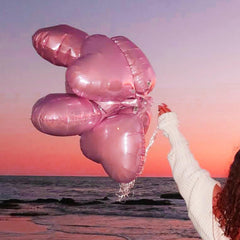 TAOYE pink heart foil balloon closeup showing durable material and shine