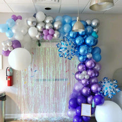 TAOYE Snowflake Foil Balloons highlight metallic accents for a magical party ambiance.