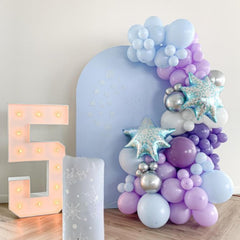 TAOYE 12-inch Snowflake Balloons bring color variety to the arch display.