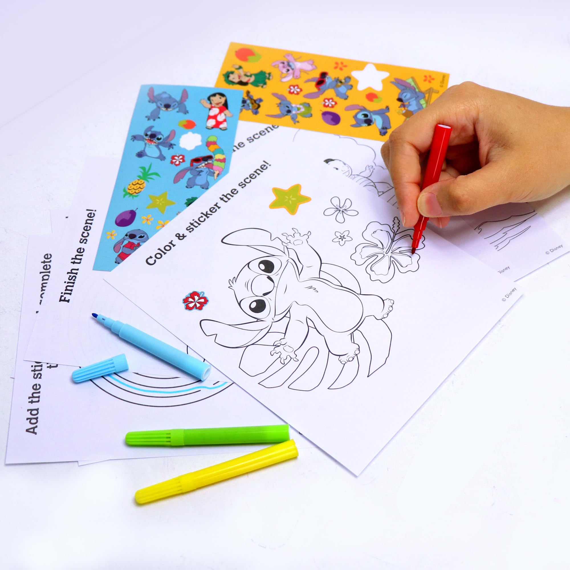 Tara Toys Disney Stitch Stow & Go activity sheets fuel imagination with games and coloring.