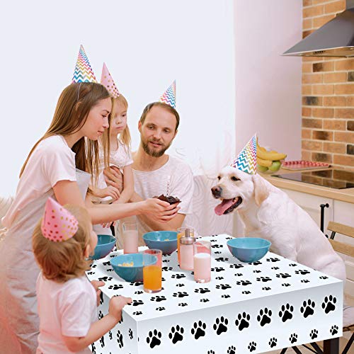 Tatuo dog-themed birthday table cover arranged with cake and balloons