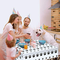Tatuo dog-themed birthday table cover arranged with cake and balloons