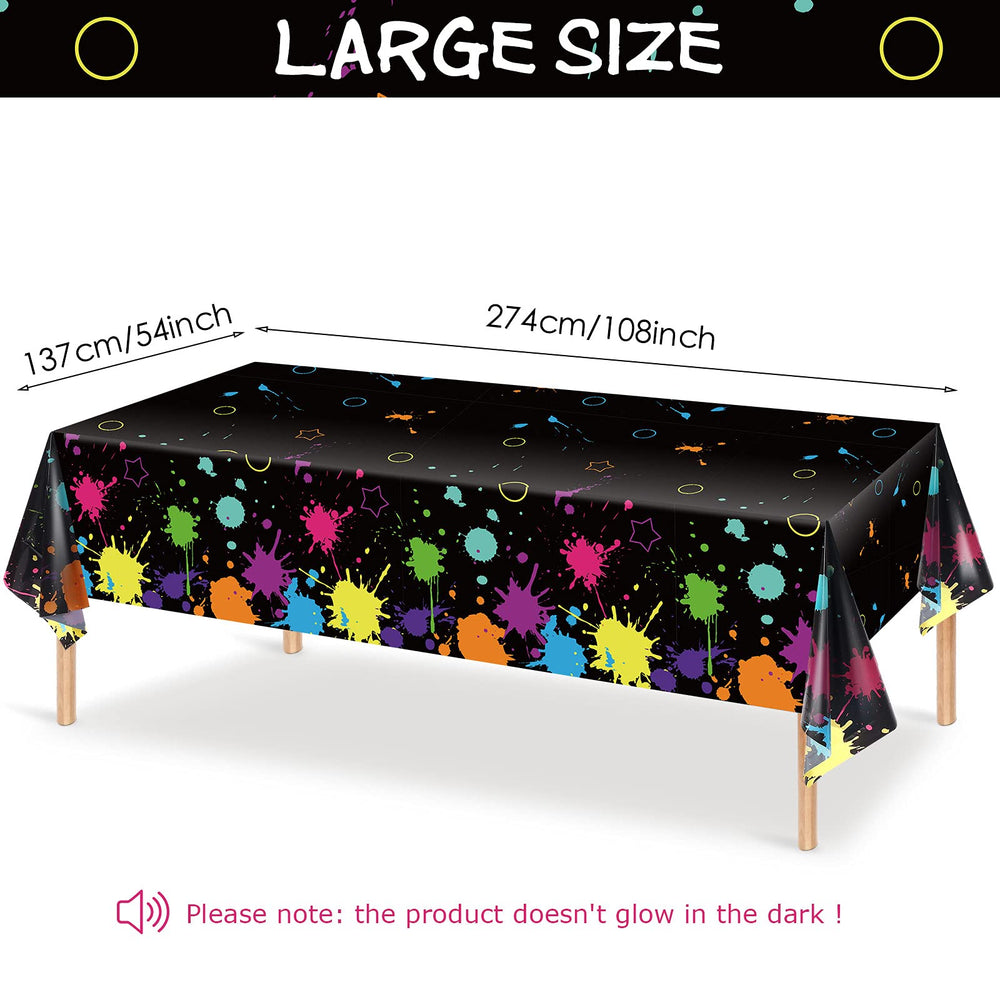 Tatuo neon glow tablecloth under black light creates dramatic neon atmosphere.