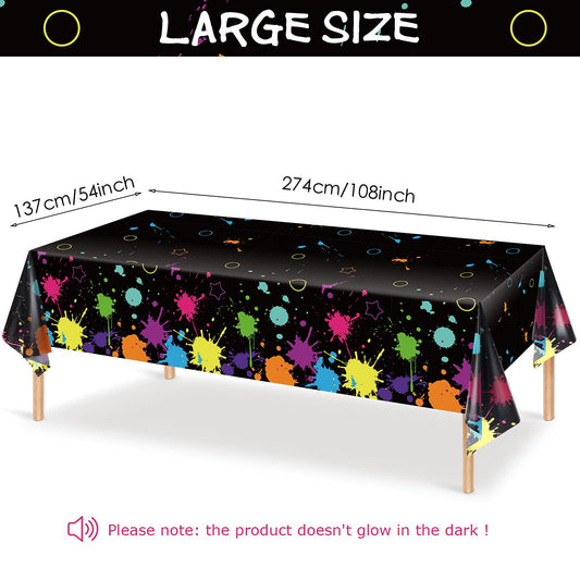 Tatuo neon glow tablecloth under black light creates dramatic neon atmosphere.