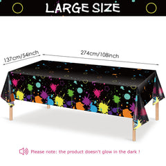 Tatuo neon glow tablecloth under black light creates dramatic neon atmosphere.
