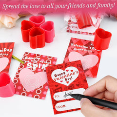 TATWOQ fidget toy closeup showing compact heart coil design