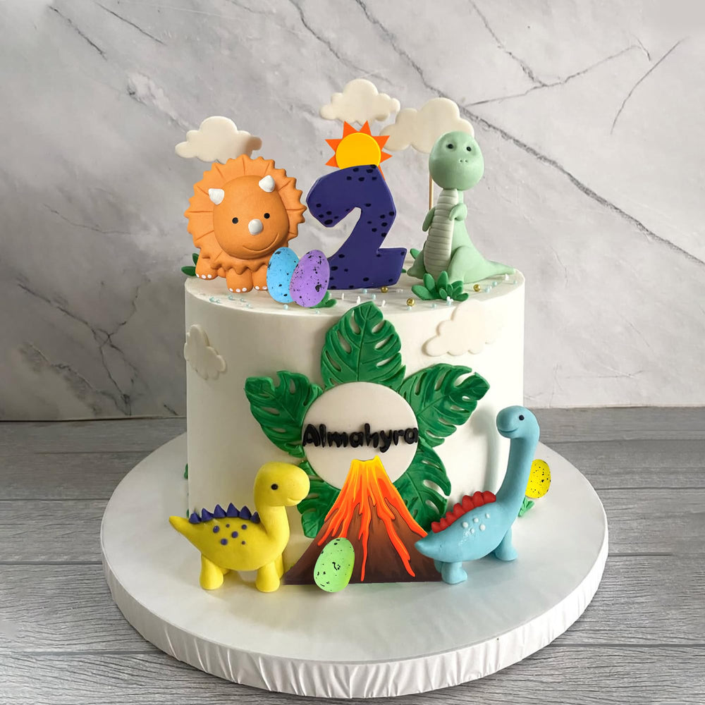 Tazimi volcano topper sparks imagination with vibrant birthday cake scenes