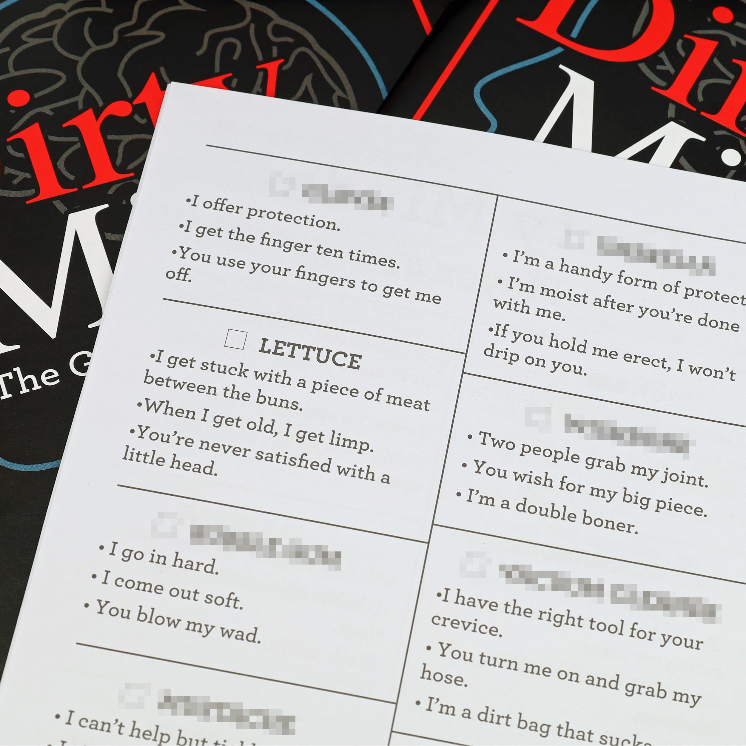 Dirty Minds clue cards with cheeky prompts for adult game night