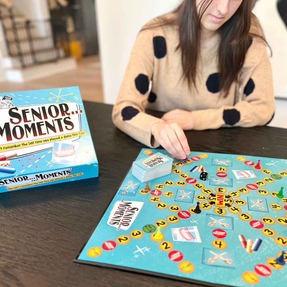 Closeup of Senior Moments card art with playful prompts for group play